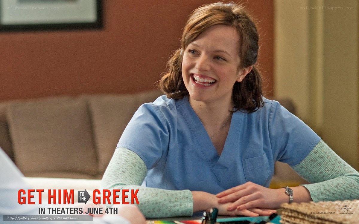 woman in scrubs smiling
