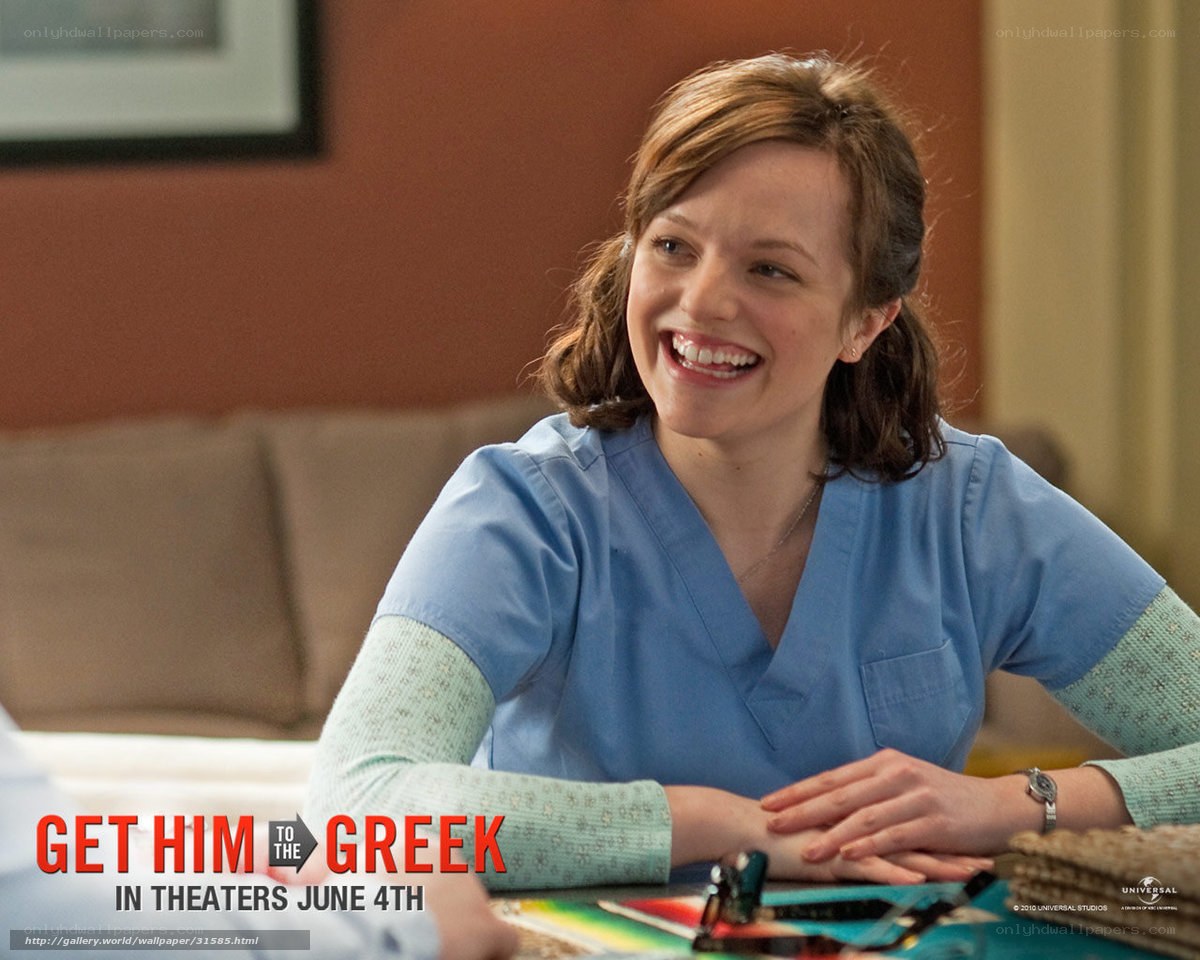 woman in scrubs smiling