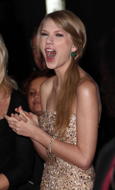 woman in sequin dress laughing