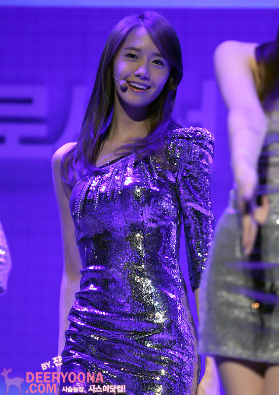 woman in sequin dress on stage