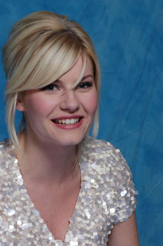 woman in sequin dress smiling