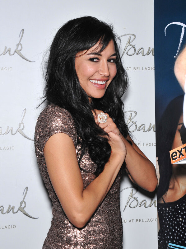 woman in sequin dress smiling