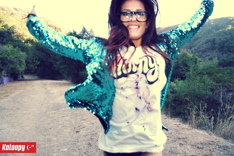 woman in sequin jacket outdoors