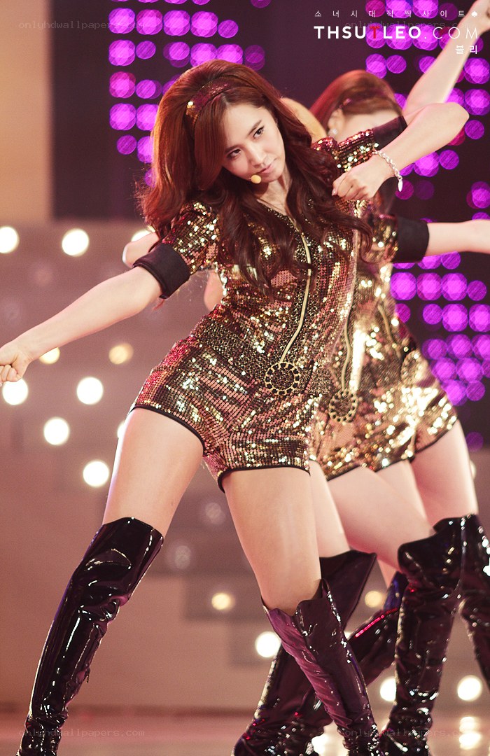 woman in sequin outfit dancing