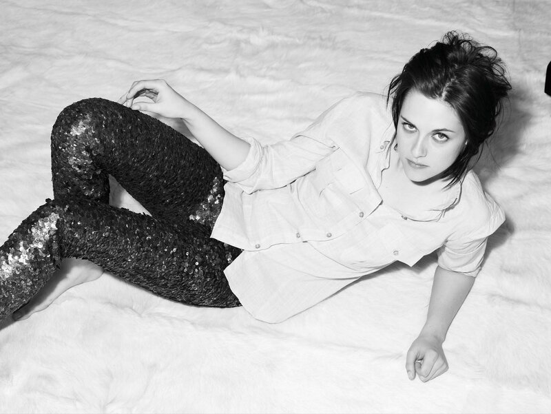 woman in sequin pants lying down