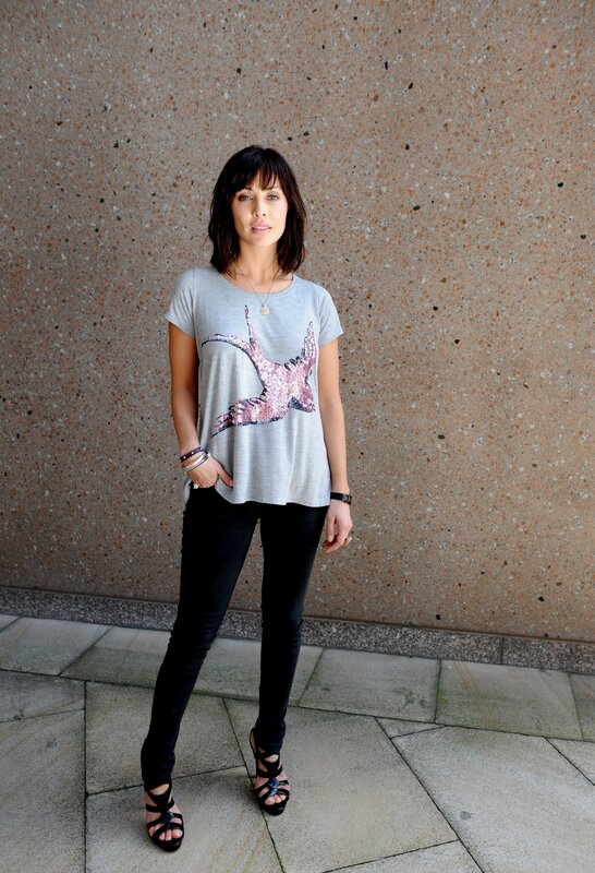 woman in sequin t-shirt