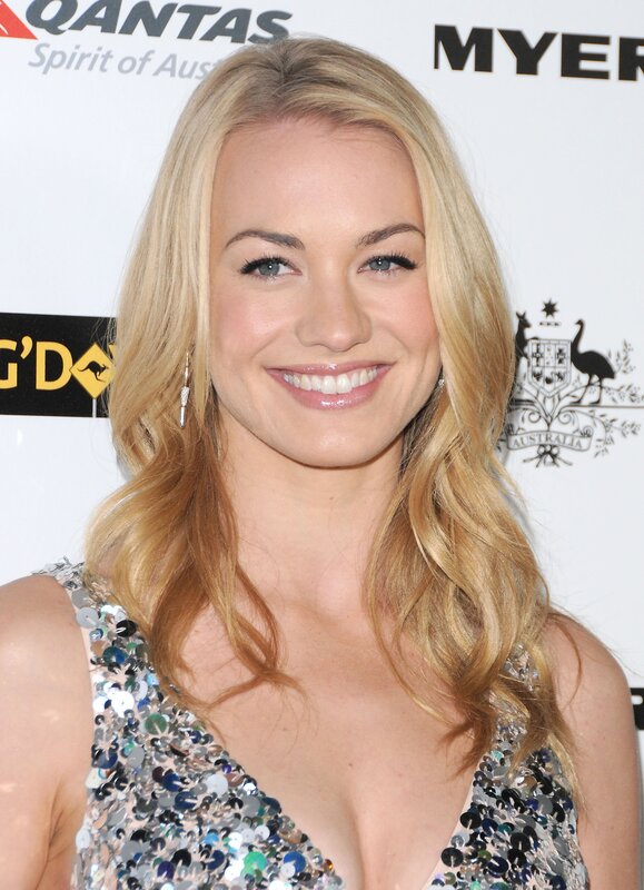 woman in sequined dress smiling