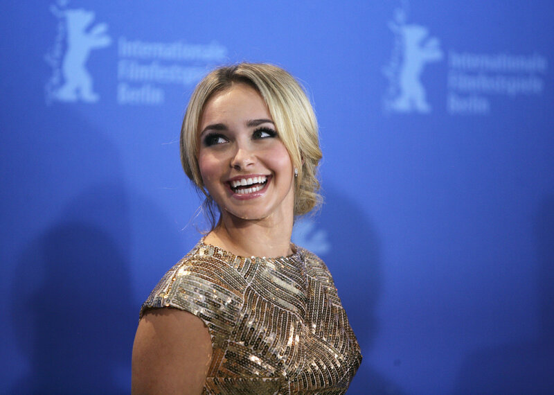woman in sequined dress smiling