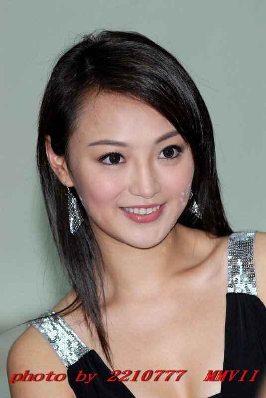 woman in sequined dress smiling
