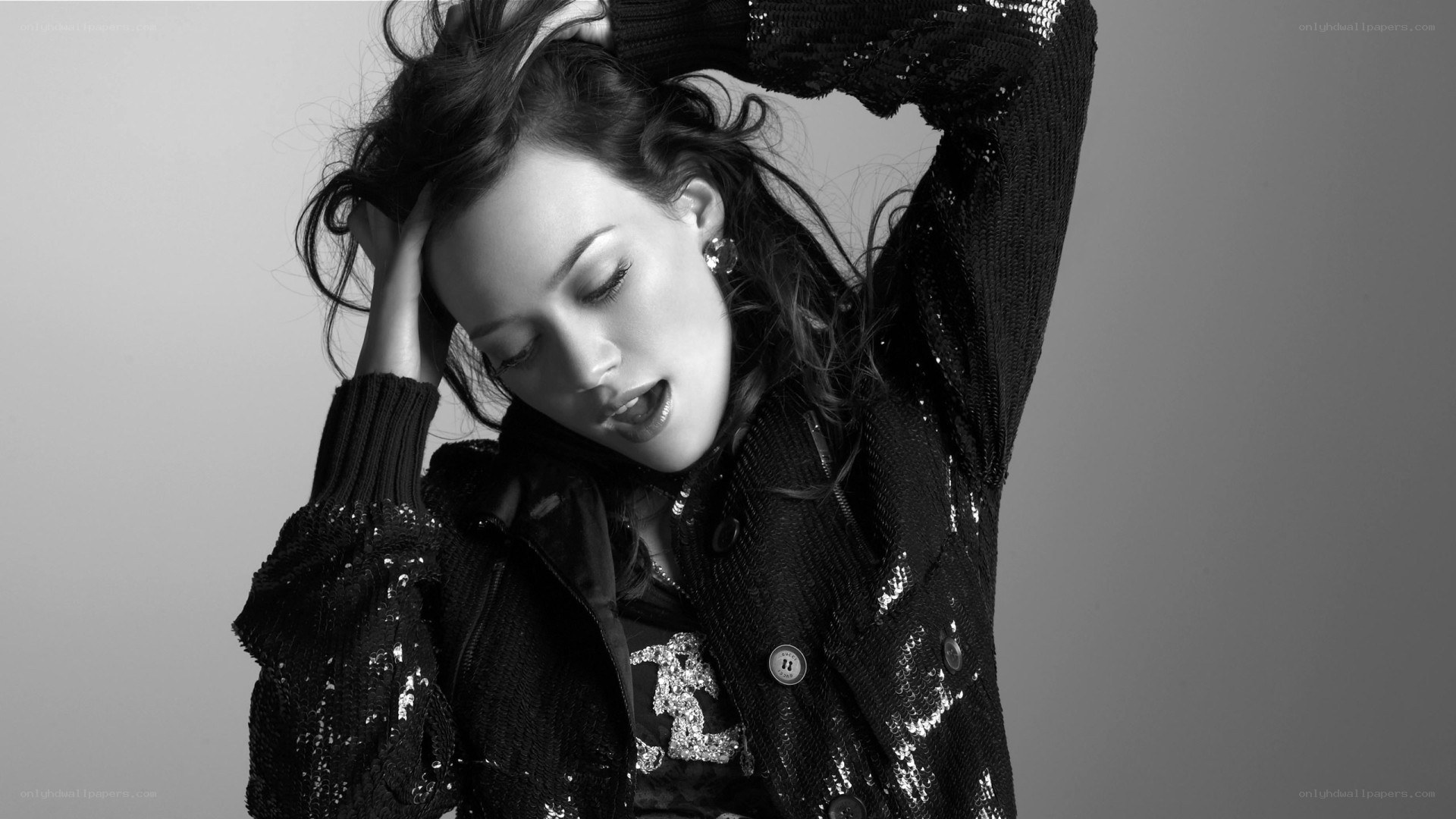 woman in sequined jacket