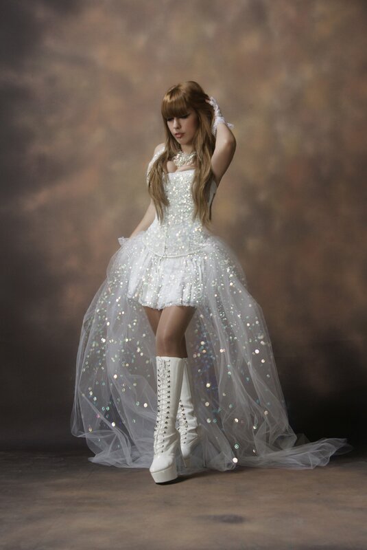 woman in sequined white dress