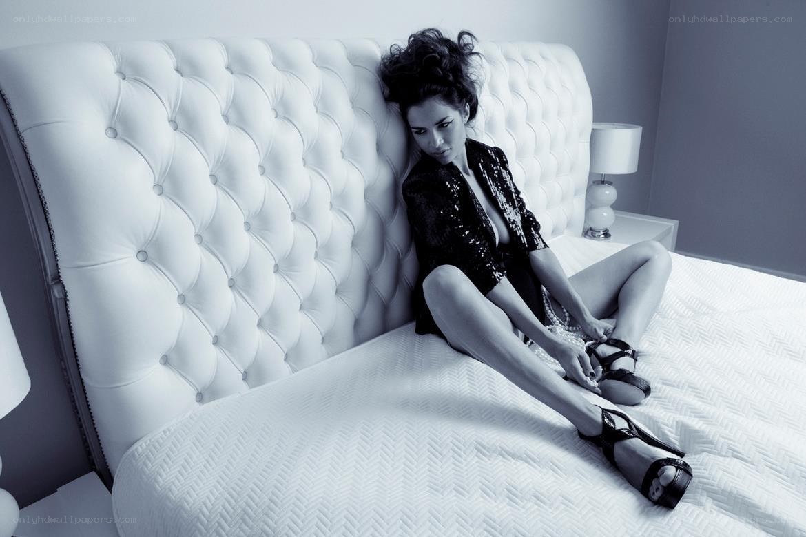 woman in sequins on bed
