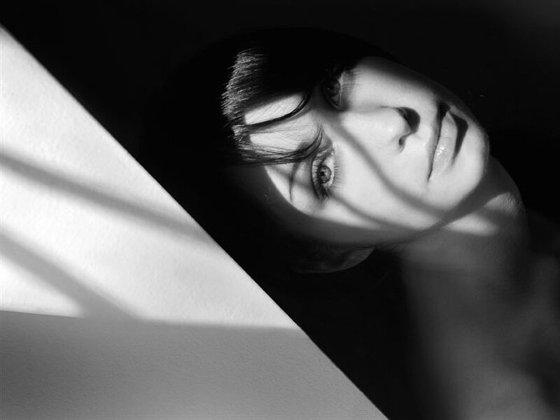 Woman in Shadow — Black, Dramatic, Photograph