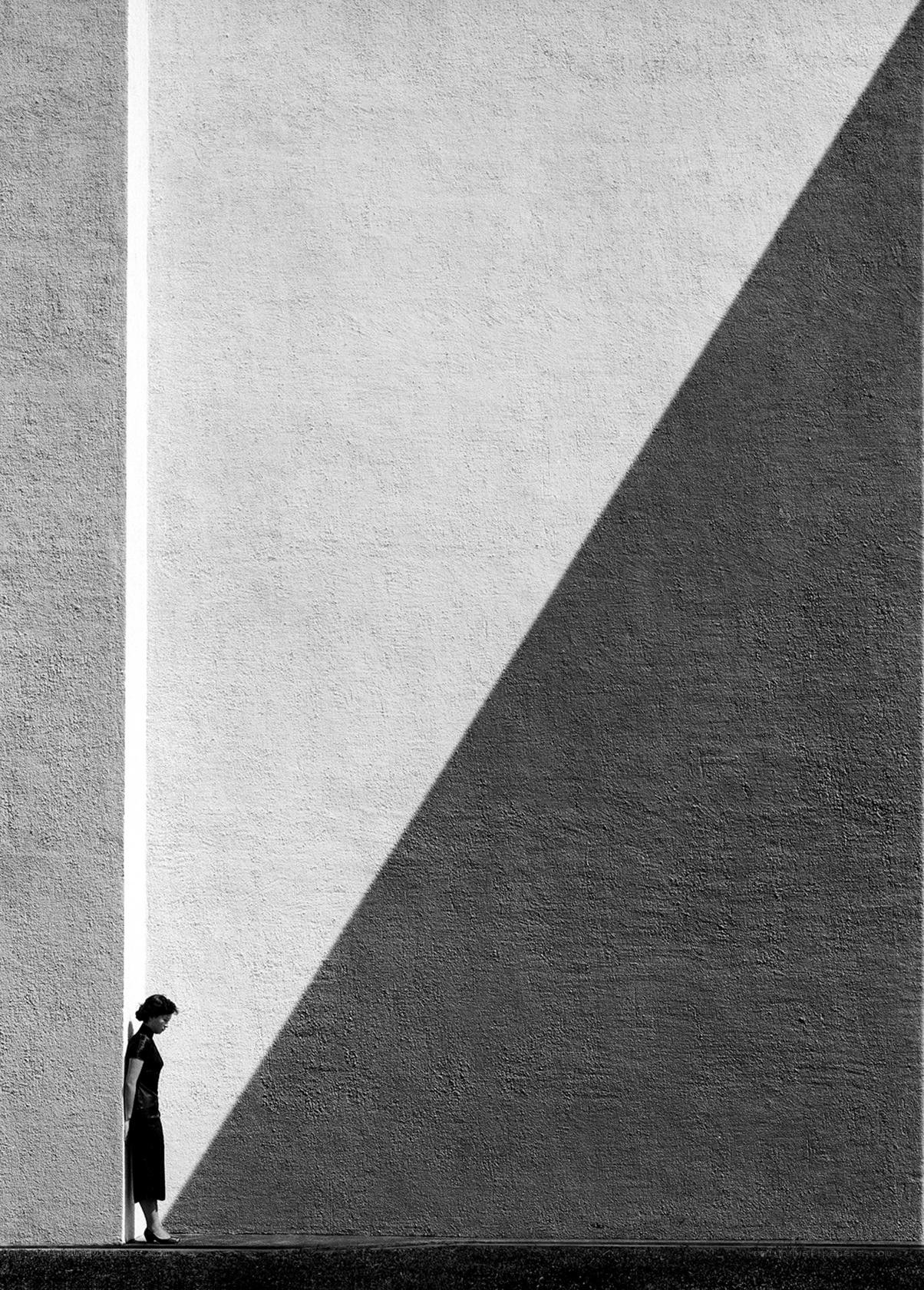 Woman in shadow on a wall