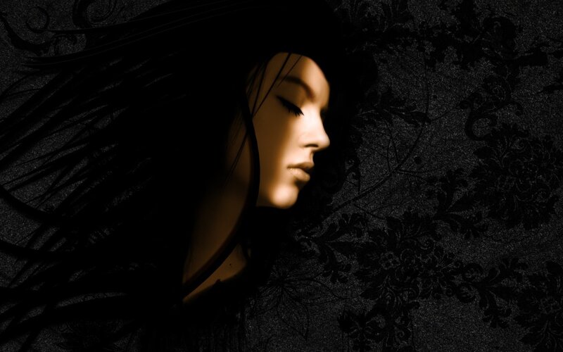 woman in shadow with long hair