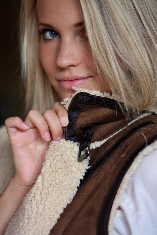 woman in shearling vest