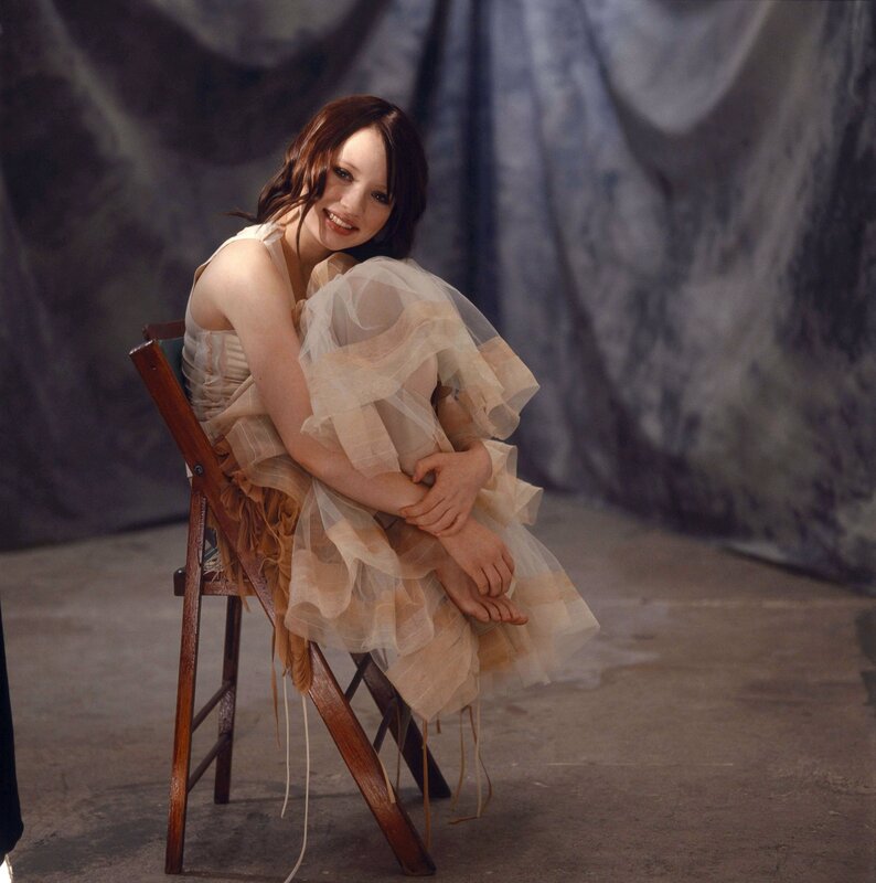 woman in sheer dress sitting