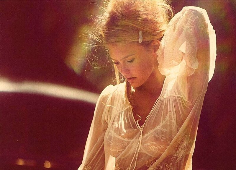 woman in sheer white blouse