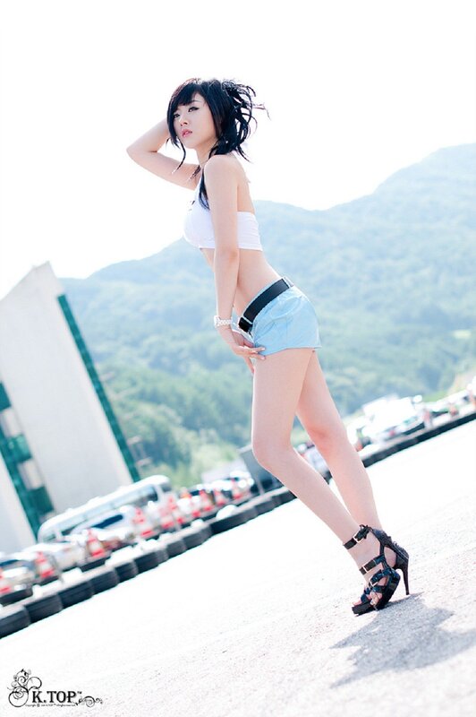 woman in shorts and high heels