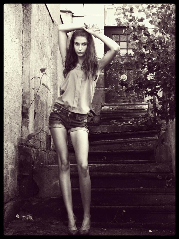 woman in shorts on steps