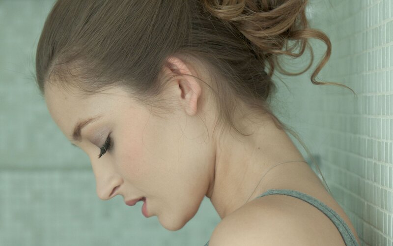 woman in shower profile