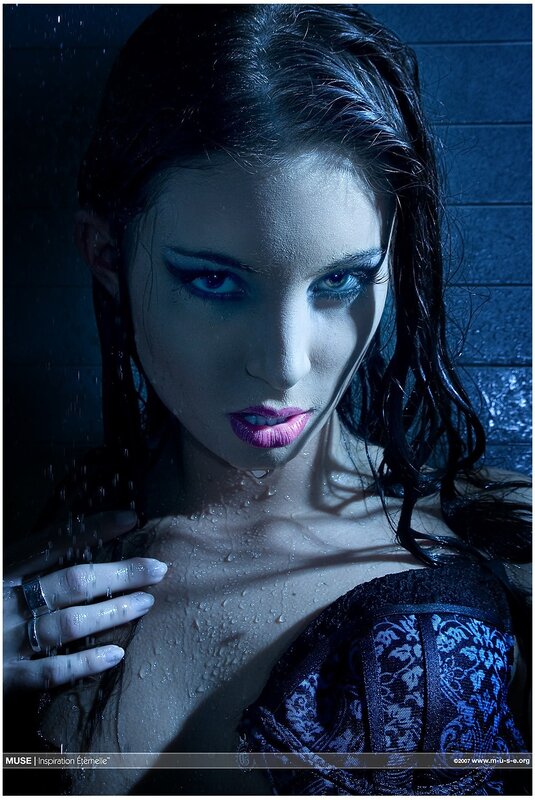 woman in shower with blue lighting