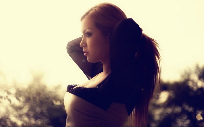 woman in silhouette at sunset