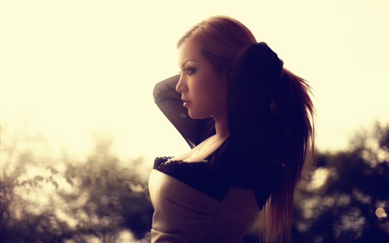woman in silhouette at sunset