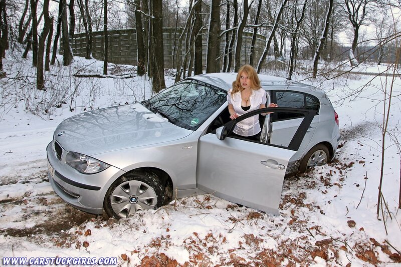 Woman in Silver Car