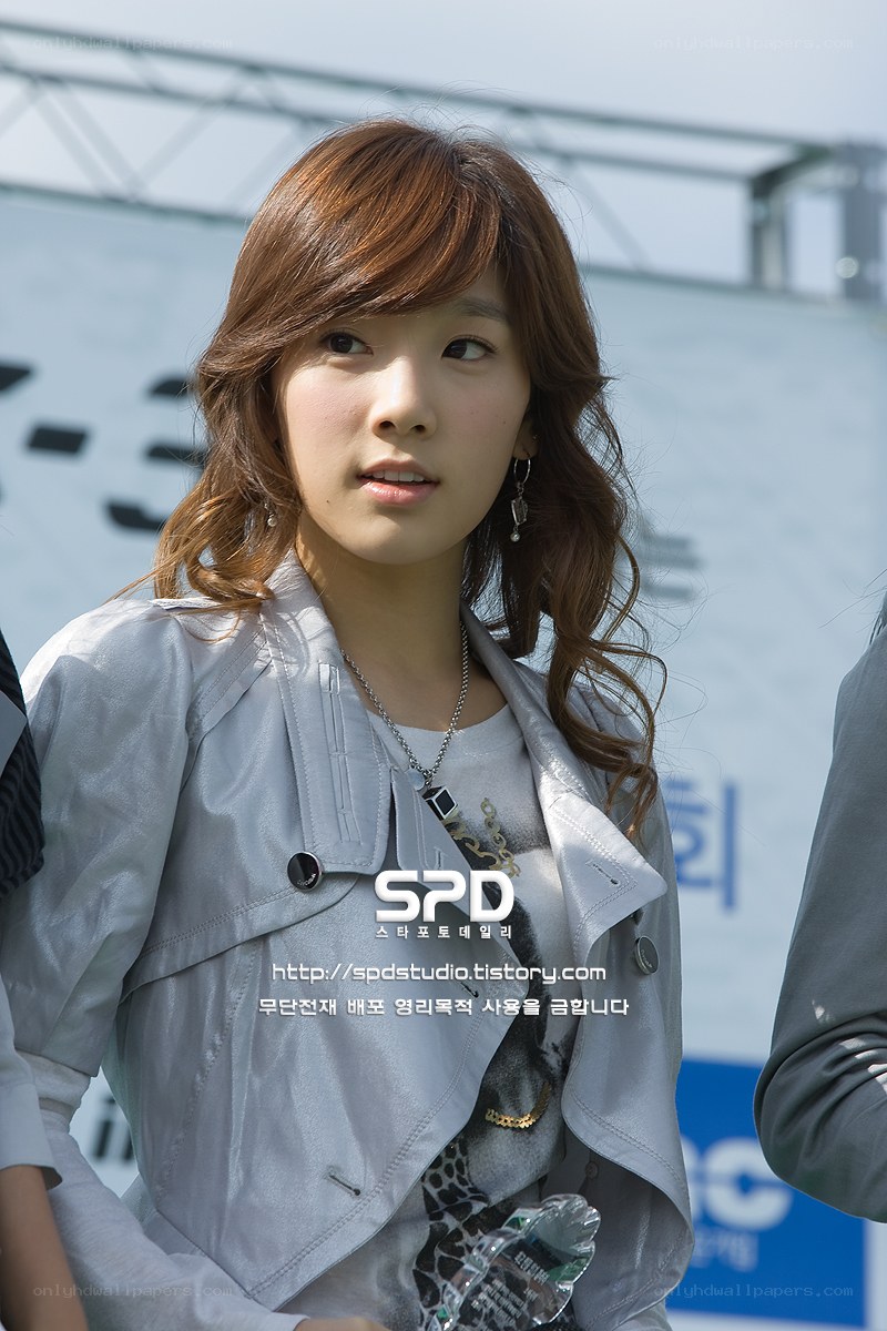 woman in silver jacket