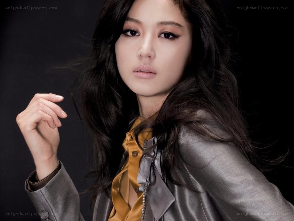 woman in silver jacket