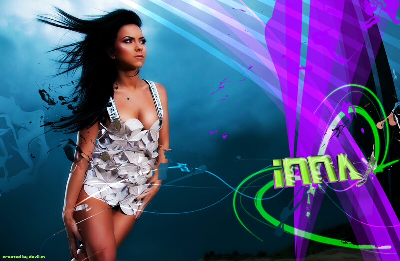 woman in silver outfit with vibrant background