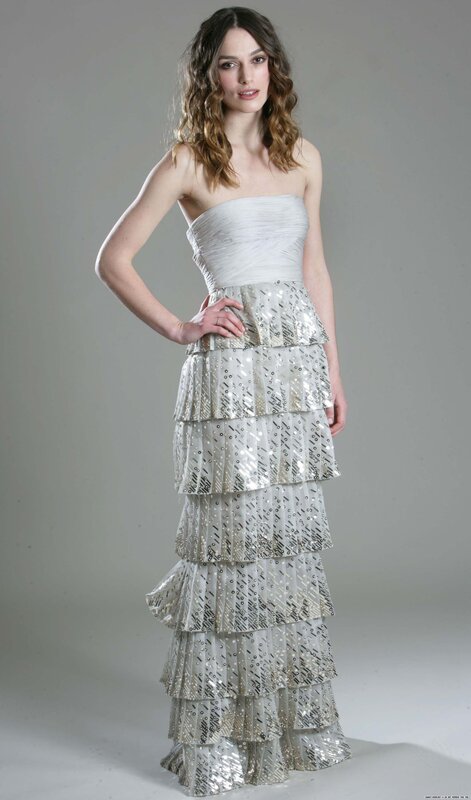 woman in silver tiered gown