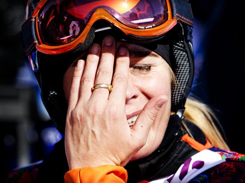 Woman in Ski Gear — Orange, Dramatic