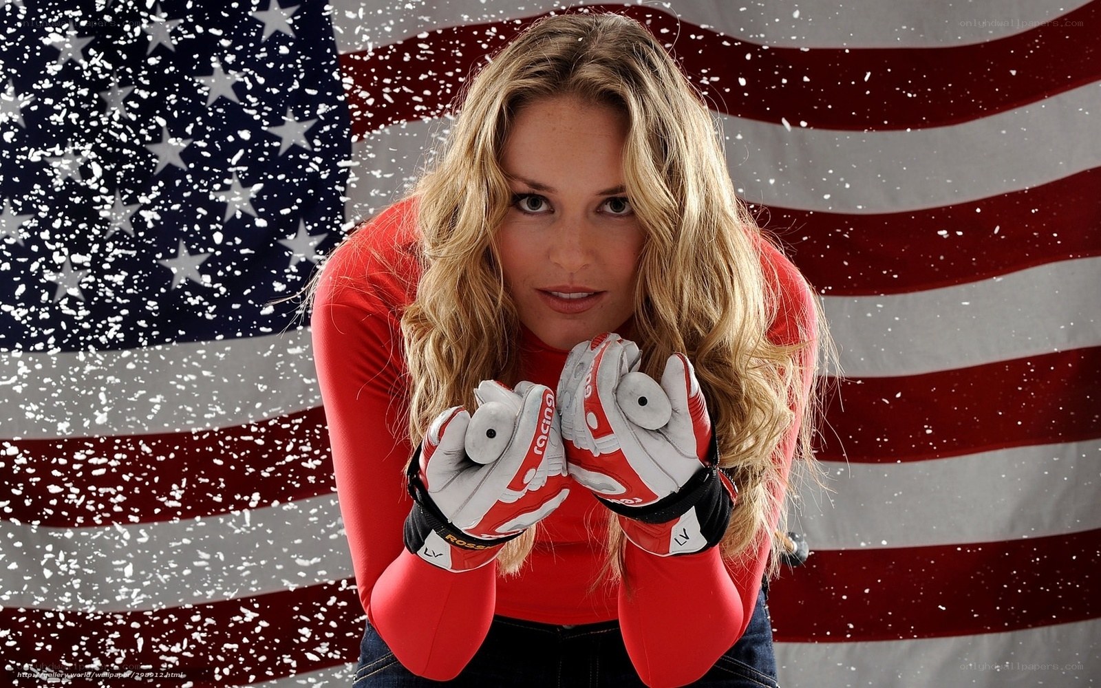 woman in ski gear with US flag