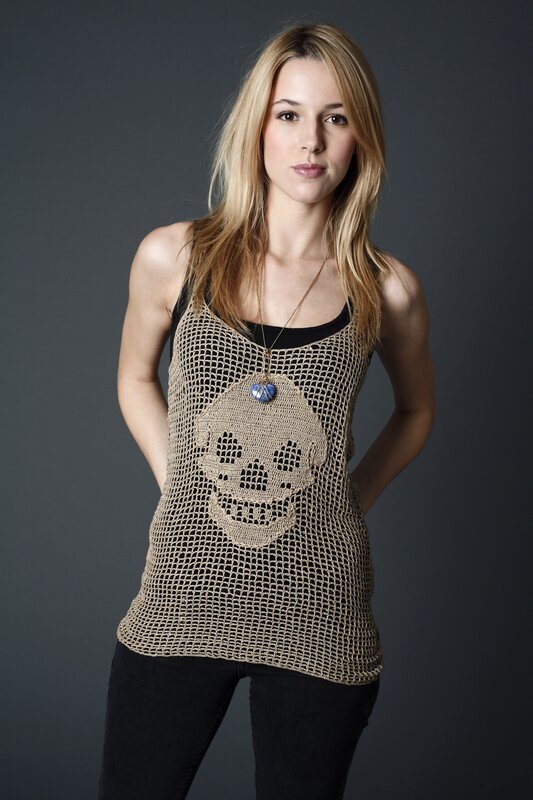 Woman in skull mesh top