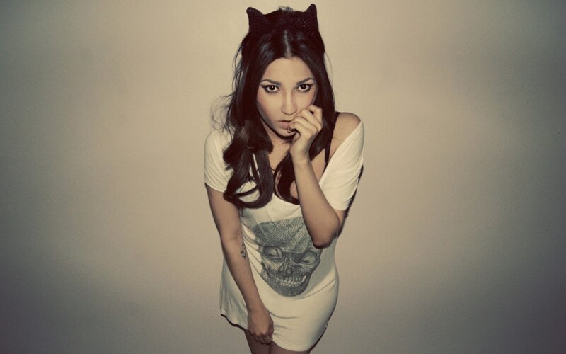 woman in skull t-shirt and cat ears