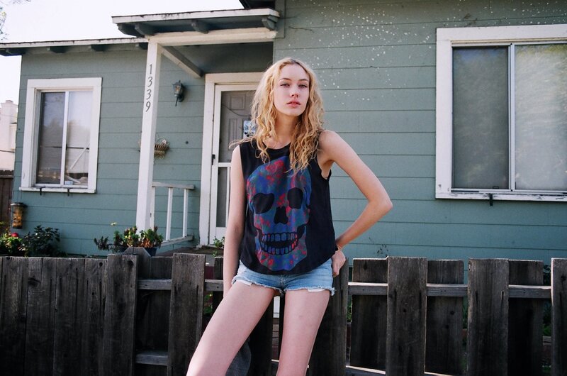 woman in skull tank top