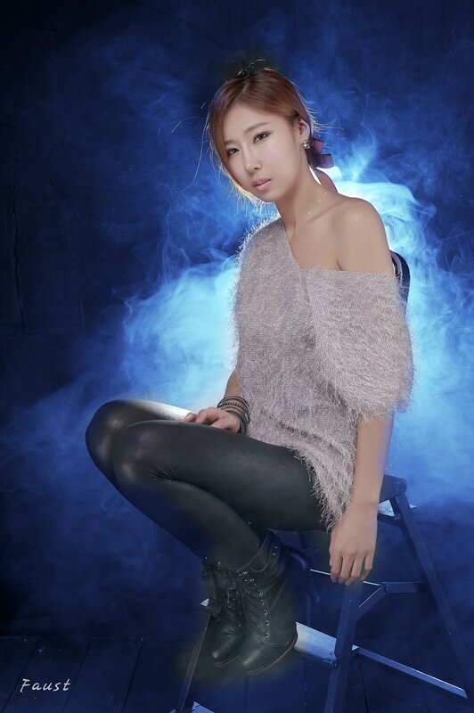 woman in smoky blue studio