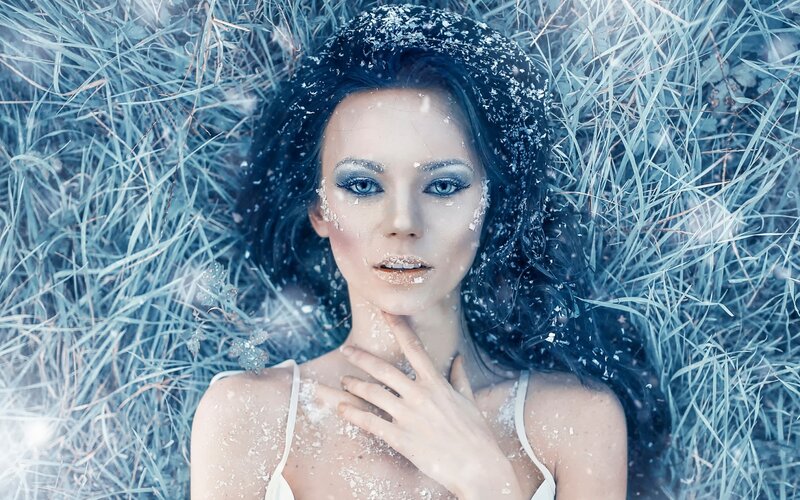 Woman in Snow-covered Grass