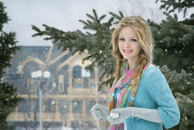Woman in snow with scarf