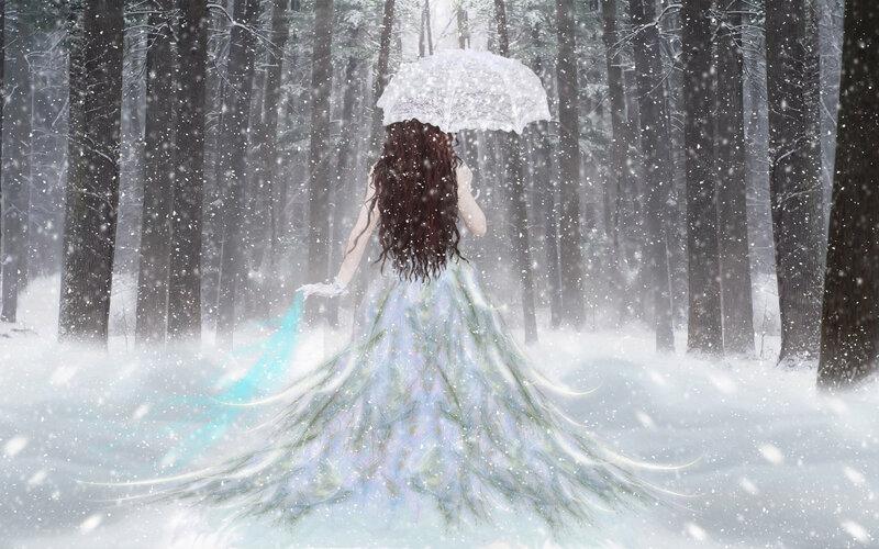 woman in snow with umbrella