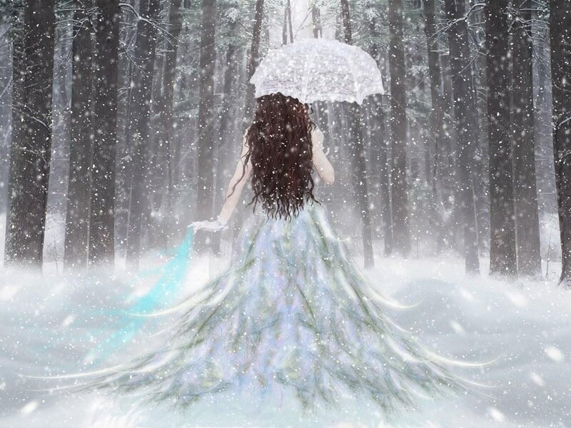 woman in snow with umbrella