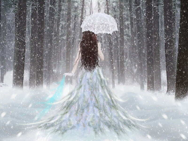 Woman in snow with umbrella