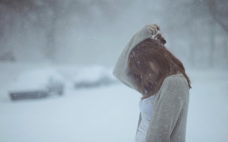 woman in snowstorm