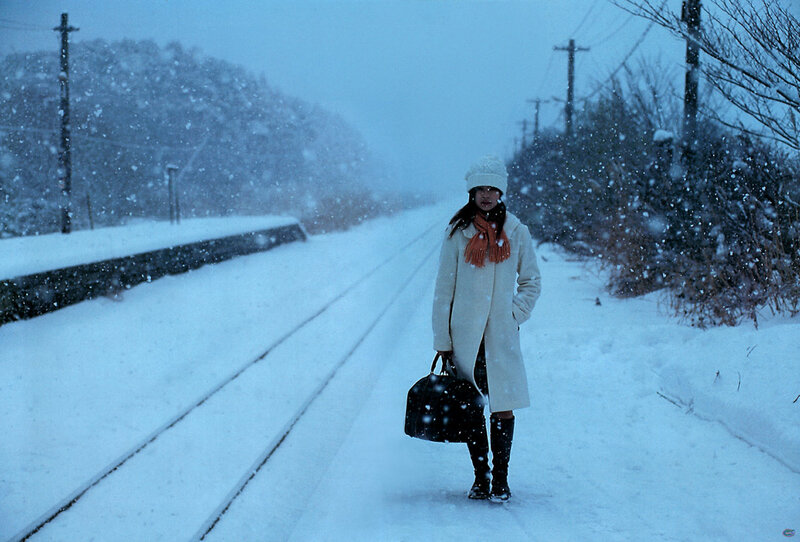 Woman in Snowstorm — White