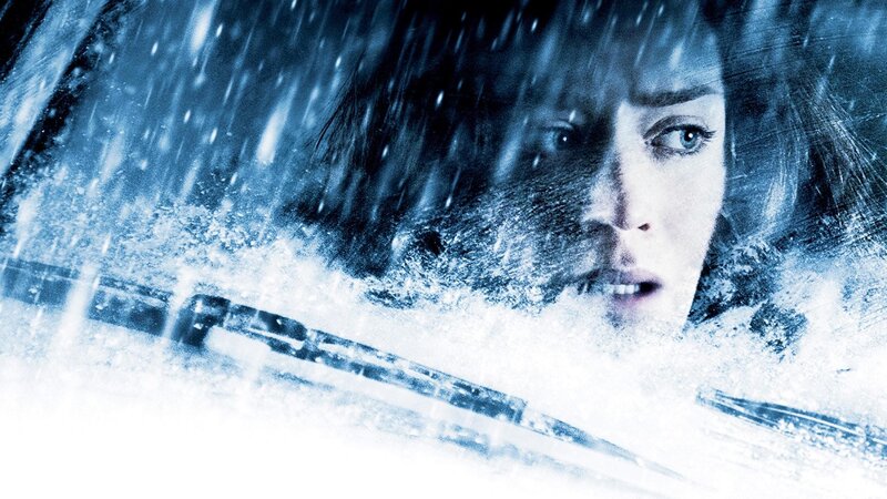 woman in snowy car