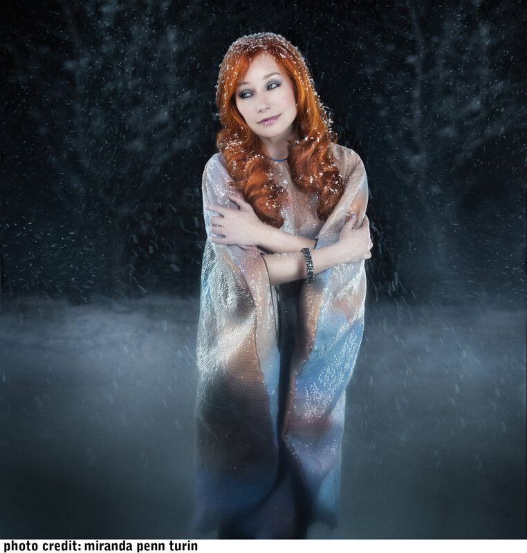 woman in snowy forest