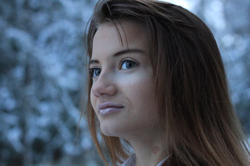 woman in snowy forest