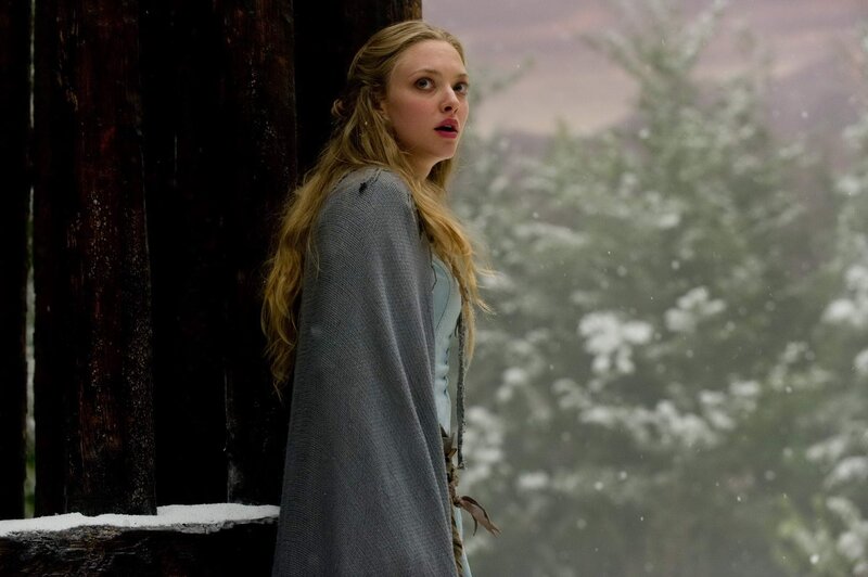 woman in snowy forest